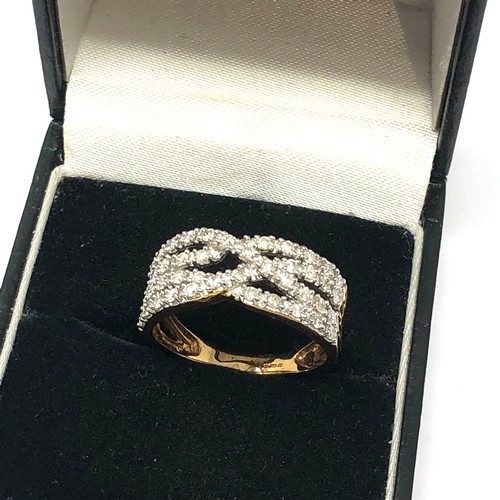 191 - 9ct gold diamond set crossover half eternity ring (3.7g)