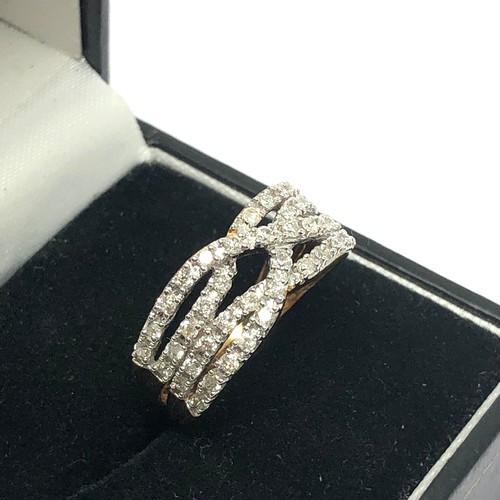 191 - 9ct gold diamond set crossover half eternity ring (3.7g)