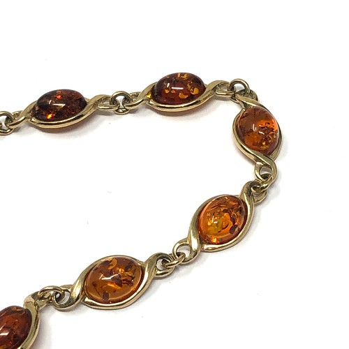 173 - 9ct gold baltic amber set twist link bracelet (6.8g)