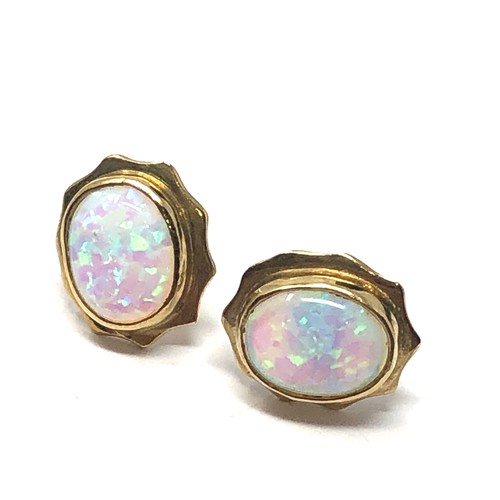 126 - 9ct gold faux opal set statement stud earrings (2.4g)