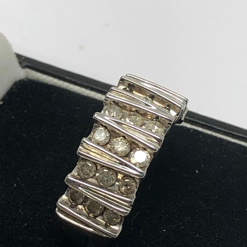 148 - 9ct white gold diamond set half eternity ring (4.4g)