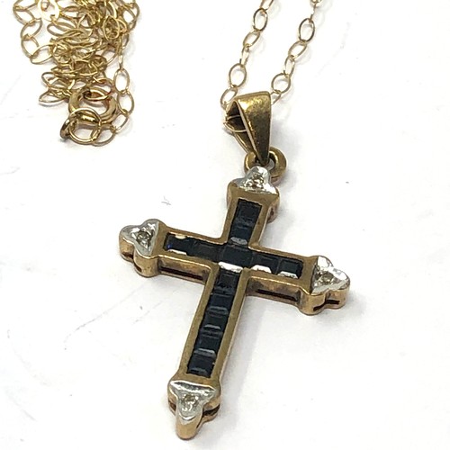 119 - 9ct gold diamond accented sapphire set cross pendant necklace (2g)