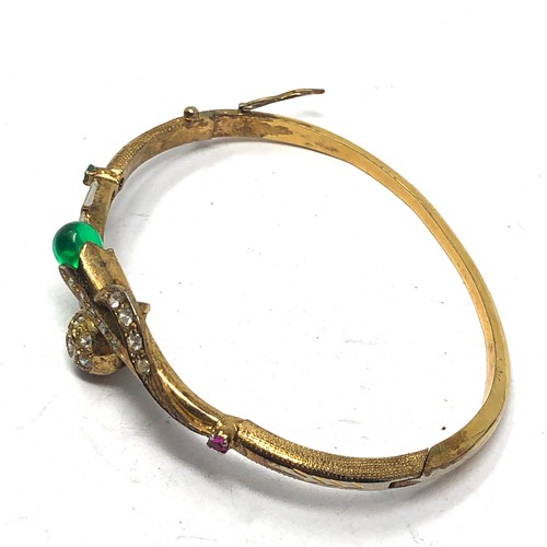 345 - .925 floral design bangle set with emerald, ruby and clear gemstone (16g)