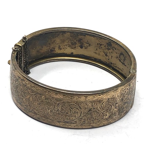 322 - .925 gold on silver etched bangle (26g)