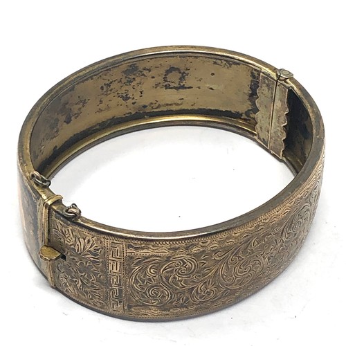 322 - .925 gold on silver etched bangle (26g)