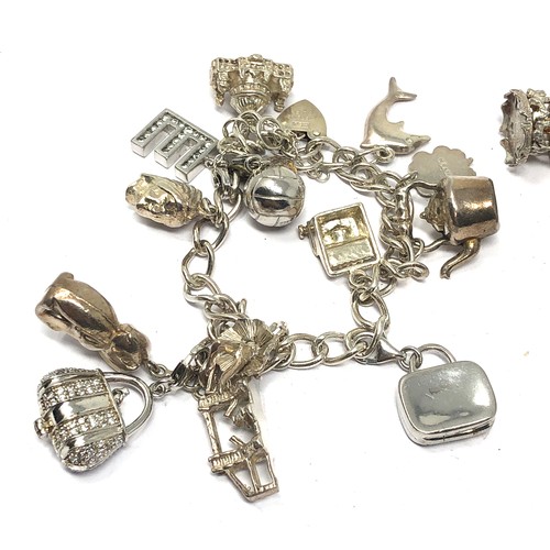 332 - .925 vintage charm bracelet with assorted charms (79g)