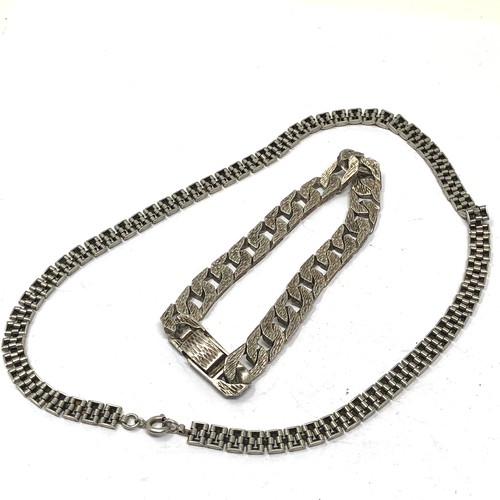 344 - 2 x .925 textured modernist silver jewellery (60g)