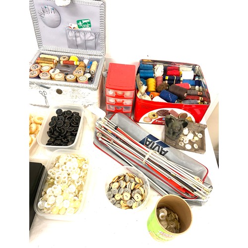 883 - Selection of sewing items and equipment to include boxes, cotton, buttons, knitting needles etc