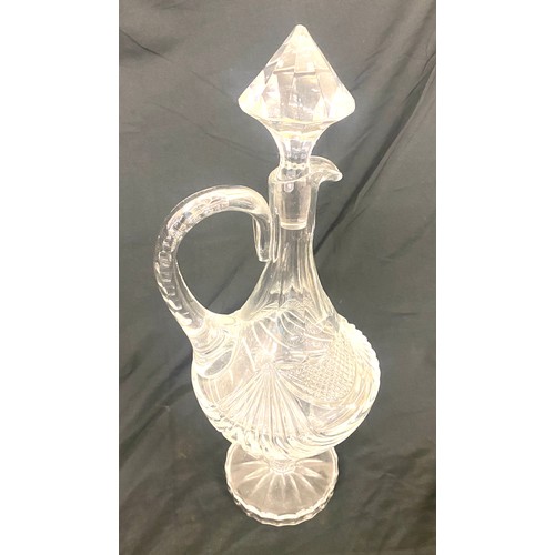 164 - Vintage cut glass claret jug by Veritable cristal height approx 18 inches