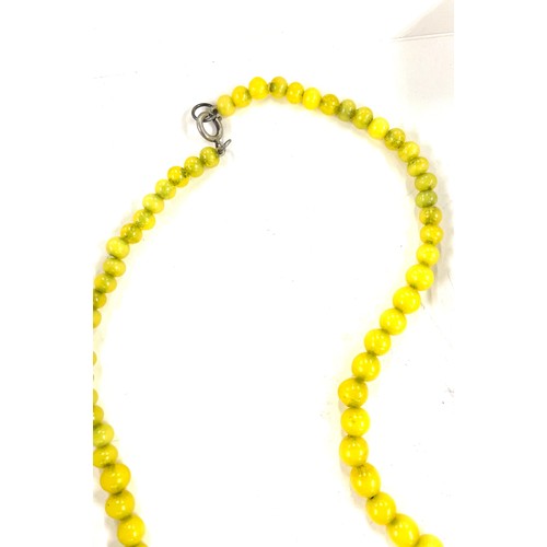 511 - Set of Vintage yellow glass beads with silver clasp, length approx 22 inches long