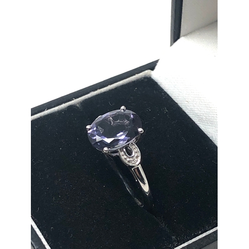 78 - 9ct white gold diamond & tanzanite ring weight 2g