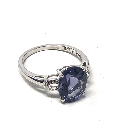 78 - 9ct white gold diamond & tanzanite ring weight 2g