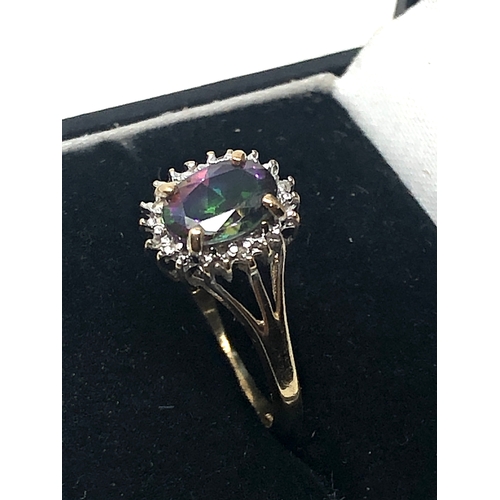 79 - 9ct  gold diamond & mystic topaz ring weight 2.5g