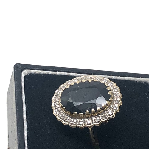 86 - large 9ct gold diamond & sapphire ring weight 4.5g