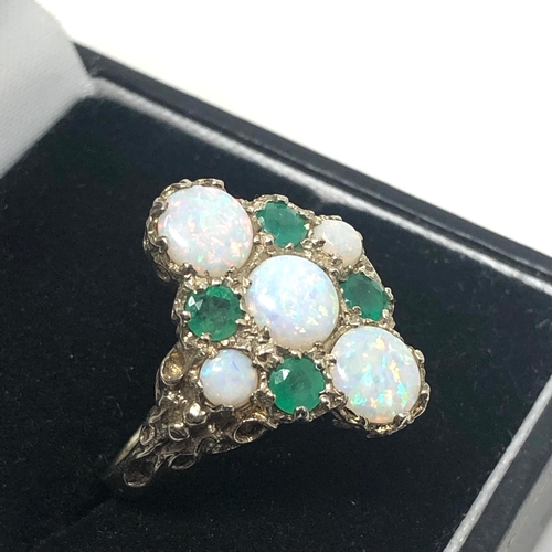 88 - 9ct gold opal & emerald ring weight 5.6g