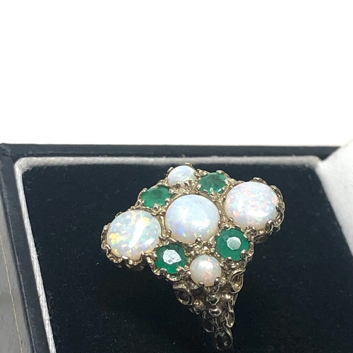 88 - 9ct gold opal & emerald ring weight 5.6g