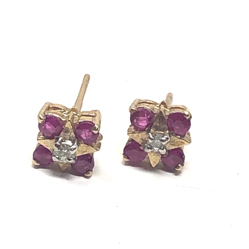 89 - 9ct gold diamond & ruby earrings weight 1.7g