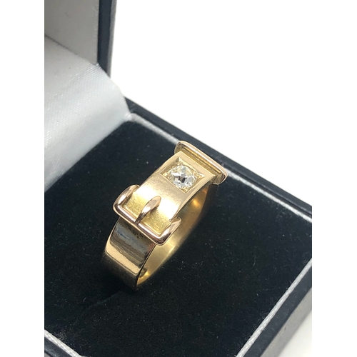 92 - Fine Antique 18ct gold diamond buckle ring central diamond measures approx 4mm dia weight of ring 7.... 