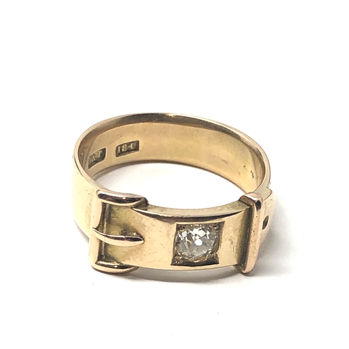 92 - Fine Antique 18ct gold diamond buckle ring central diamond measures approx 4mm dia weight of ring 7.... 