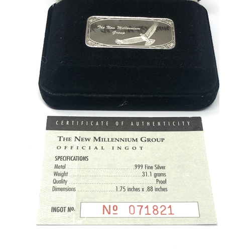 3 - Boxed the new millennium group official 1oz 999.silver ingot with coa