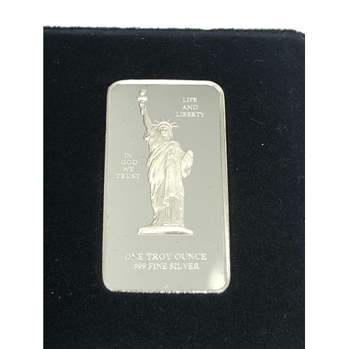 4 - Boxed the new millennium group official 1oz 999.silver ingot with coa