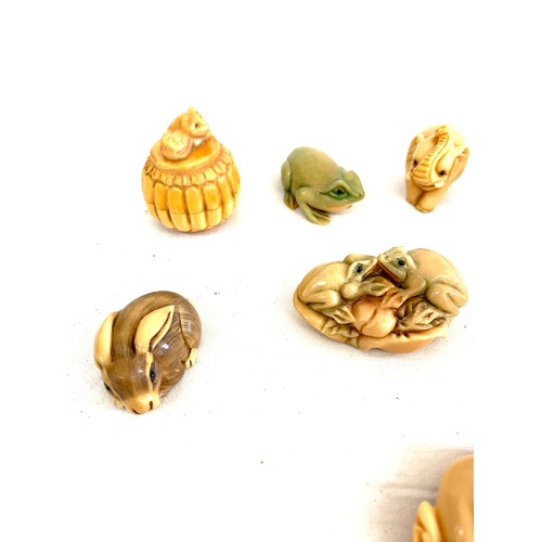 97 - Selection of 8 signed Tagua nut netsukes to include Owl, duck, frog etc