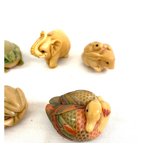 97 - Selection of 8 signed Tagua nut netsukes to include Owl, duck, frog etc