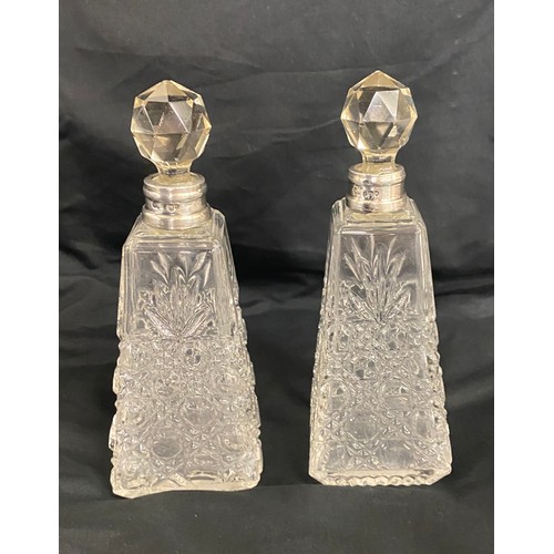 499 - Matching pair of 1912 silver rimmed scent bottles