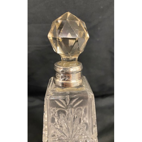 499 - Matching pair of 1912 silver rimmed scent bottles