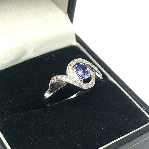 62 - 9ct white gold diamond & tanzanite ring  weight 2.2g