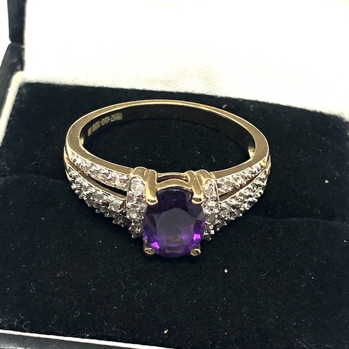 63 - 9ct gold diamond & amethyst ring set with 0.15ct diamonds weight 3.5g