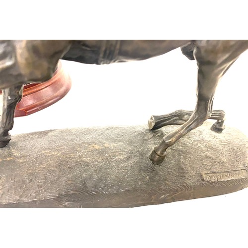 74 - 2 Vintage resin horse figures on stands, damage to leg of horse with rider