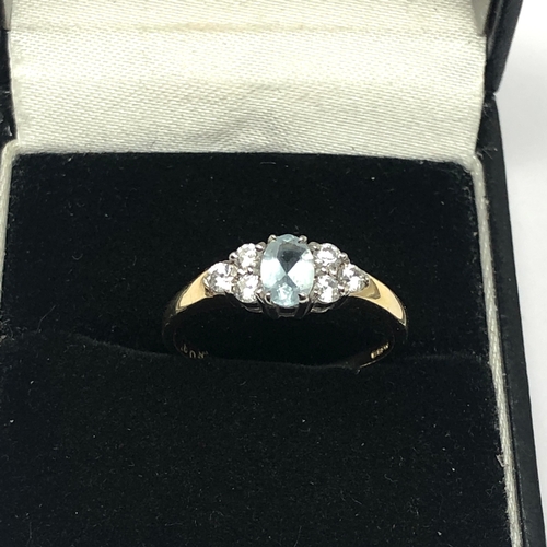 108 - 9ct gold aquamarine & white stone ring weight