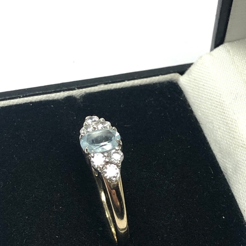 108 - 9ct gold aquamarine & white stone ring weight