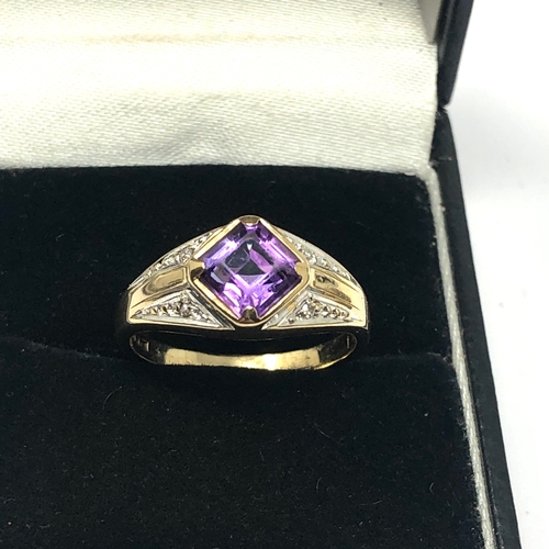 113 - 9ct gold diamond & amethyst ring set with 0.15ct diamonds weight 2.9g