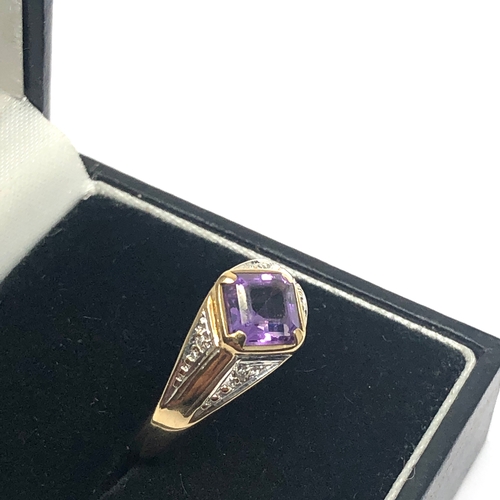 113 - 9ct gold diamond & amethyst ring set with 0.15ct diamonds weight 2.9g