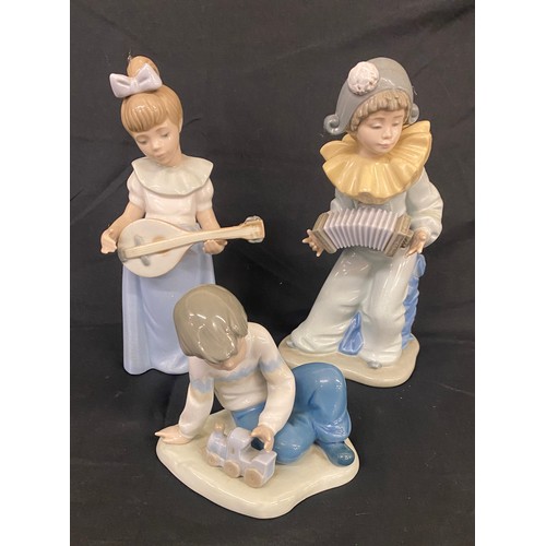 4 - Selection of assorted Nao figures includes Boy playing accordian, girl playing with a musical instru... 
