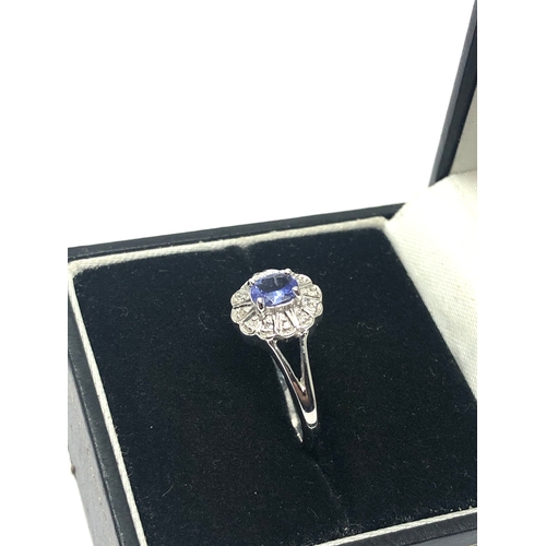 115 - 9ct white gold tanzanite diamond ring set  weight 2.2g