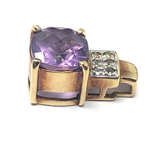 118 - 9ct gold amethyst & diamond statement pendant measures approx 1.9cm drop weight 3.6g