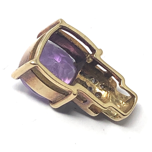 118 - 9ct gold amethyst & diamond statement pendant measures approx 1.9cm drop weight 3.6g