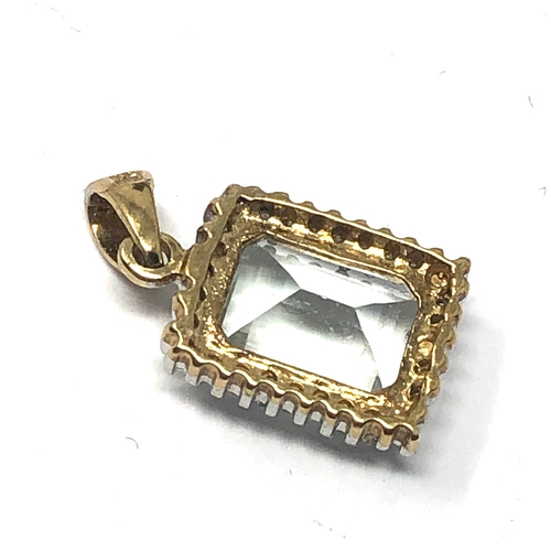 122 - 9ct gold gemstone set pendant measures approx 1.7cm drop weight 1.2g