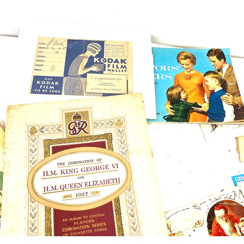 41 - Selection of vintage items to include post cards, records, advertising labels etc