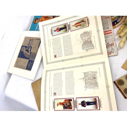 41 - Selection of vintage items to include post cards, records, advertising labels etc