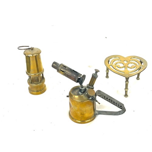 23 - Selection of brass to include a Aboptimus burner, brass stand and a small brass minors lamp
