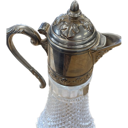 13 - Vintage silver plate cut glass claret jug marked Highlands measures approx 12 inches high