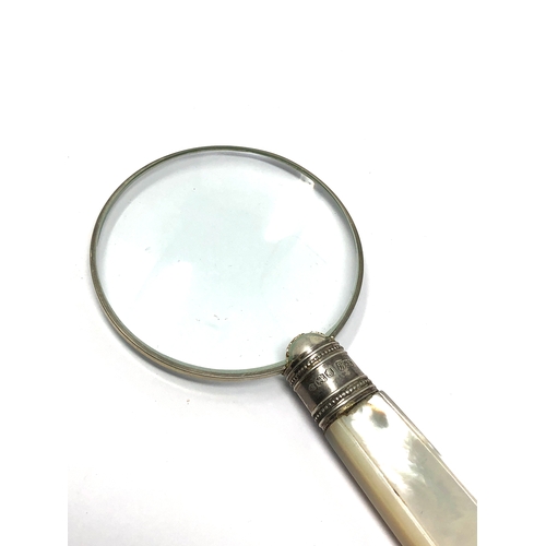 19 - Antique silver mounted & mother of pearl handle magnifying glass measures approx 14cm long