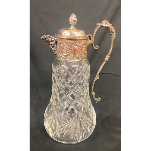 107 - A lead crystal decanter with silver plated lid measures approx height 11.5 inches