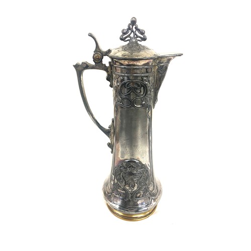 91 - W.M.F art nouveau plated claret jug measures approx 16.5 inches tall