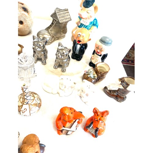 168 - Selection of collectable and novelty items to include salt and pepper pots, money boxes, small orien... 