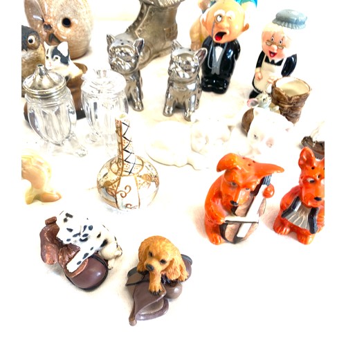 168 - Selection of collectable and novelty items to include salt and pepper pots, money boxes, small orien... 